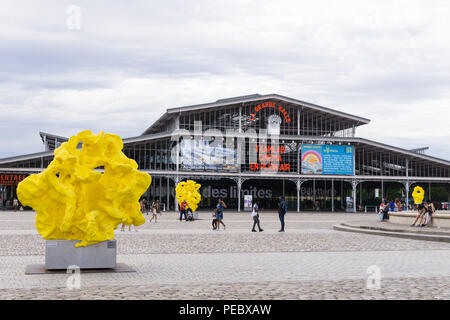 Will Ryman sculptures The Heads in front of La Grande Halle de la Villette in the 19th arrondissement of Paris, France. Stock Photo