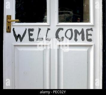 Misspelled shop doorway sign. Stock Photo
