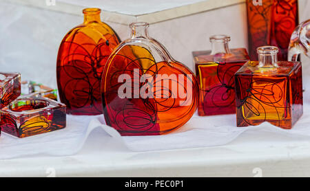 Colourful glass bottles for sale on market stall Dubrovnik Croatia Stock Photo