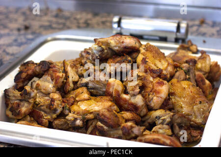 Chicken wings and ribs fried on grill Stock Photo