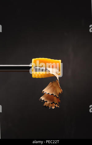 close up of pencil shavings from sharpener on black Stock Photo