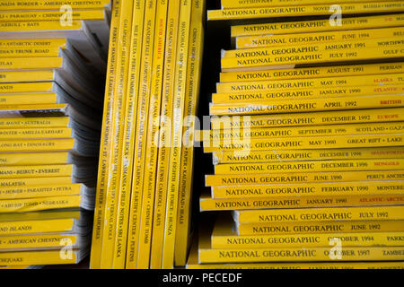 Stacks of National Geographic magazines Stock Photo
