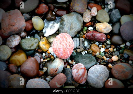 New Year Hike on Jan. 2, 2016.  Location Goat Rock, CA along the Sonoma County Coast.  Peaceful photo captures this beautiful colorful pebbles Stock Photo