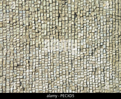 Old weathered stone mosaic texture. Natural wall finishing material Stock Photo