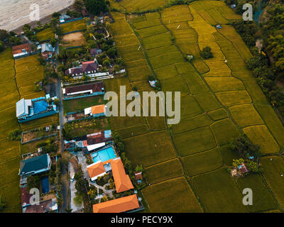 Aerial drone view if the village and ricefields in Bali, Indonesia Stock Photo