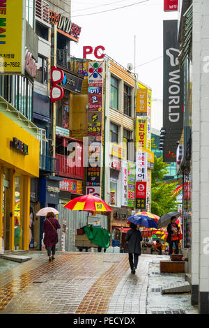 South Koreans with Umbrellas on Rainy Day Busan Pusan South Korea Asia Stock Photo