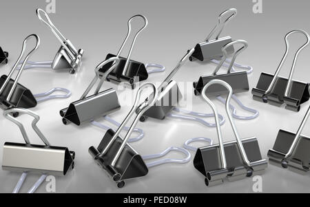 Several binder clips placed on the grey background. 3D rendering. Stock Photo