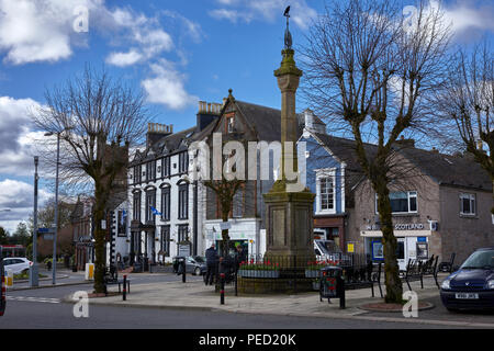 Buccleugh Arms Hotel and war memorial in central Moffat. Scotland Stock Photo