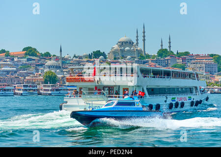 Istanbul, Turkey - July 17, 2018: Police motorboat and pleasure boat in the Golden Horn inlet in Istanbul Stock Photo