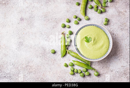 Green peas puree or soup Stock Photo