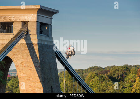 A special shape hot air balloons (motorbike) from the Bristol International Balloon Fiesta over the Avon Gorge and the Clifton Suspension Bridge. Stock Photo