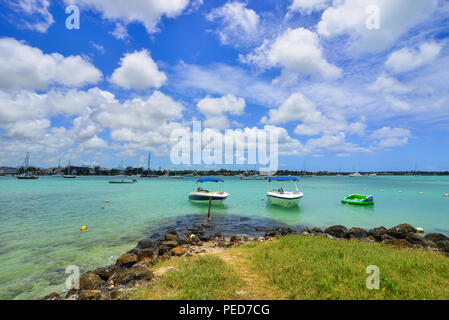 Grand Baie, Mauritius - Jan 10, 2017. Seascape of Grand Baie, Mauritius. Mauritius is a major tourist destination, ranking 3rd in the region. Stock Photo