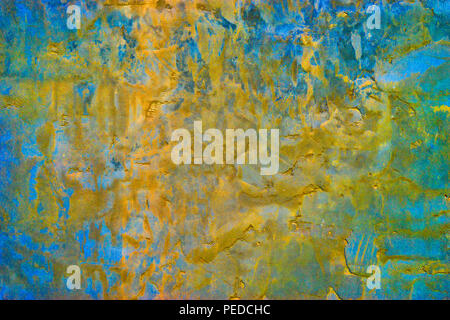 Concrete background in blue-yellow color with large heterogeneous texture. Stock Photo