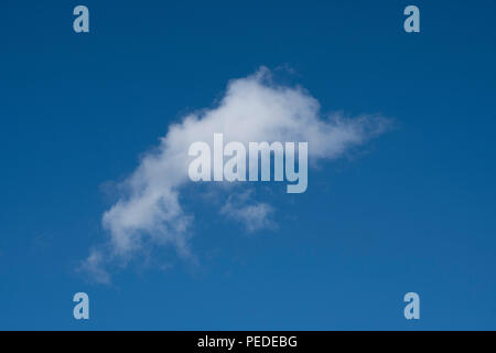 Single cloud in a blue sky Stock Photo