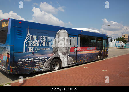 Local blue bus advertising one liberty observation deck in Philadelphia, USA Stock Photo
