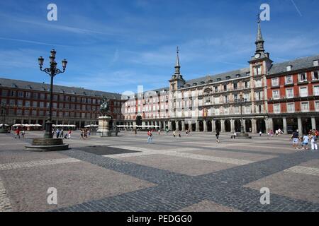 MADRID, SPAIN - SEPTEMBER 2, 2009: People visit the main square - Plaza Mayor in Madrid. Madrid is the Spanish capital city with 3,165,235 inhabitants Stock Photo
