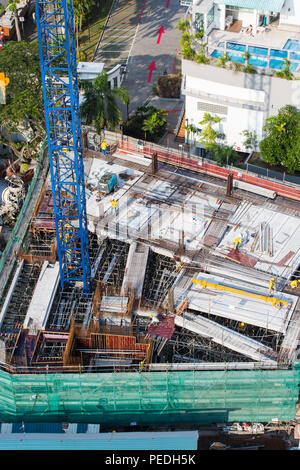 Vertical aerial view of on-going construction industrial project. Singapore. Stock Photo