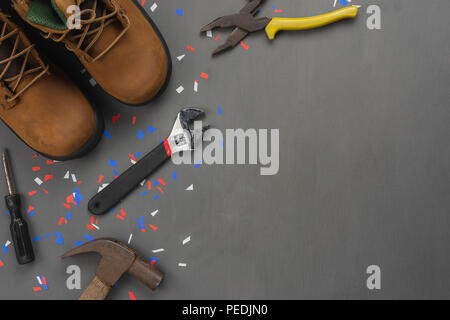 Table top view aerial image of decoration the sign of USA labor day on Sep 3,2018 background concept.Flat lay accessories tools & clothing for worker  Stock Photo