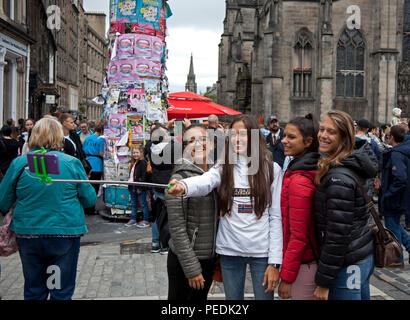 Edinburgh Fringe Festival 2018, young female tourists take selfie Edinburgh, Scotland, UK Stock Photo