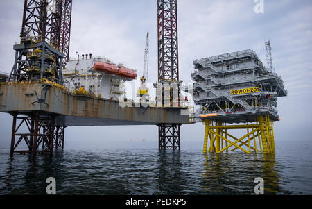 Atlantic Amsterdam jacked up adjacent to Offshore Substation (OSS) Z01 on Race Bank Offshore Wind Farm, UK Stock Photo