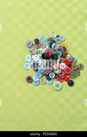 Colored small buttons on a green background 2018 Stock Photo