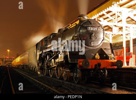 73129 at Bury Bolton Street at night. Stock Photo
