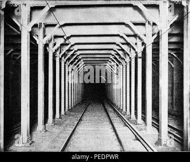 Black and white photograph showing standard steel beams and girders used to construct a New York City subway tunnel in the early twentieth century, 1884. Courtesy Internet Archive. () Stock Photo