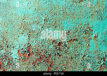 Rust on a green metal sheet, rusty background, rusty metal fence Stock Photo