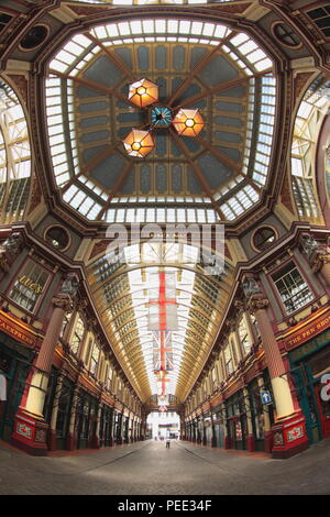 Central interior of restored Victorian covered Leadenhall Market in London taken with fish-eye lens. Leadenhall Market dates back to the 14th century.