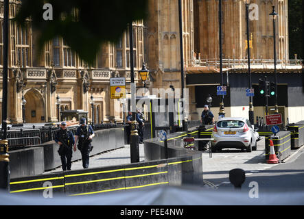 Armed police officers outside the Houses of Parliament, London, UK ...