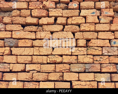 Rough not plastered bricks wall of an obsolete building Stock Photo