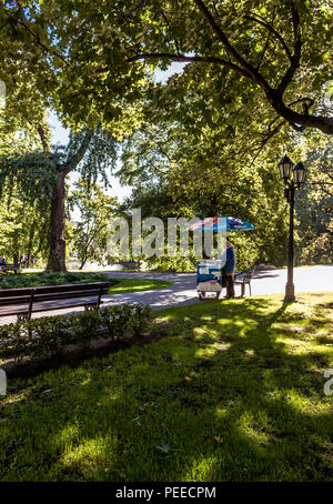 RIGA, LATVIA-SEPTEMBER 09: Ice cream stall in the Bastion Hill park (Bastejkalns). This is nice and quiet park in the center of Riga on september 09,  Stock Photo