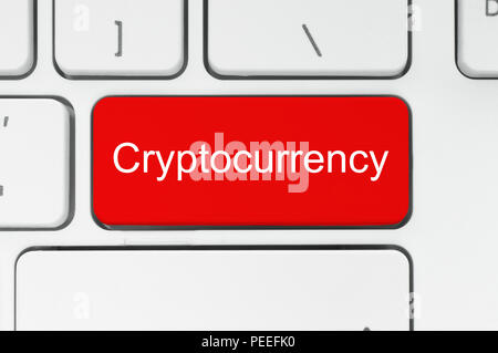 Cryptocurrency concept. Red button with Cryptocurrency word on the keyboard close-up Stock Photo