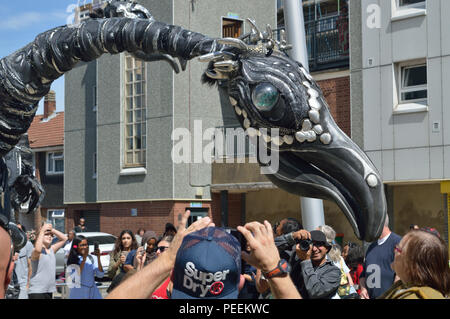 Dutch street theatre group Close Act Theatre performing their SAURUS show at the 2018 Ferry Festival in North Woolwich, Newham, London Stock Photo