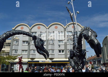 Dutch street theatre group Close Act Theatre performing their SAURUS show at the 2018 Ferry Festival in North Woolwich, Newham, London Stock Photo