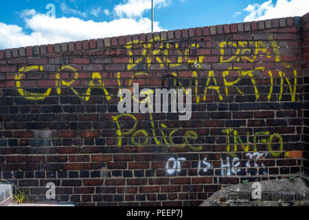 Drug dealer's name sprayed on local canal bridge for Police information, Bilston. Stock Photo