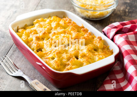 Typical American macaroni and cheese on wooden table Stock Photo