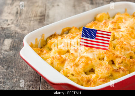 Typical American macaroni and cheese on wooden table Stock Photo