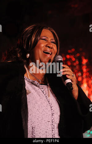 Aretha Franklin performs at the 85th annual New York Stock Exchange Christmas tree lighting ceremony on Wall Street, New York City. December 4, 2008 Credit: Dennis Van Tine/MediaPunch Stock Photo