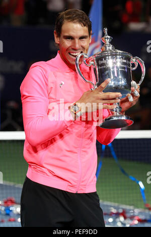 US Open 2017 champion Rafael Nadal of Spain posing with US Open trophy during trophy presentation after his final match victory against Kevin Andersen Stock Photo
