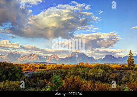 Grand Teton Mountian panoramic from the overlook next to Jackson Lake Lodge during a crisp fall day. Stock Photo