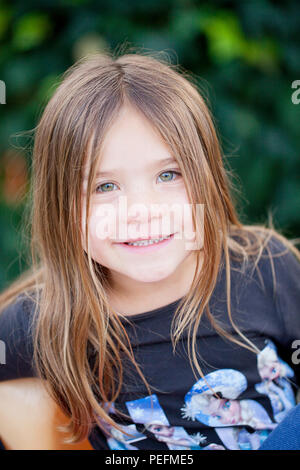 Portrait of a pretty young girl smiling Stock Photo