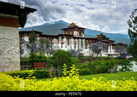 Beautiful view of Buddhism religion with Dzongh and Tigers Nest on a sunny day. Photo taken in Bhutan and showing unique culture and religion. Stock Photo