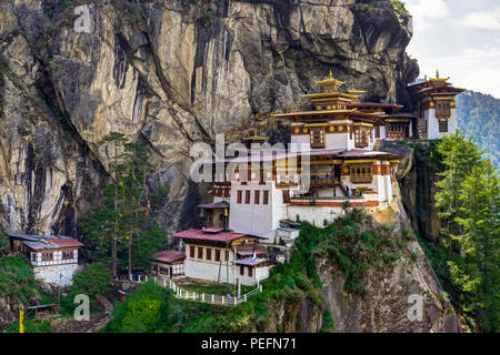 Beautiful view of Buddhism religion with Dzongh and Tigers Nest on a sunny day. Photo taken in Bhutan and showing unique culture and religion. Stock Photo