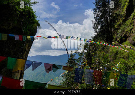 Beautiful view of Buddhism religion with Dzongh and Tigers Nest on a sunny day. Photo taken in Bhutan and showing unique culture and religion. Stock Photo