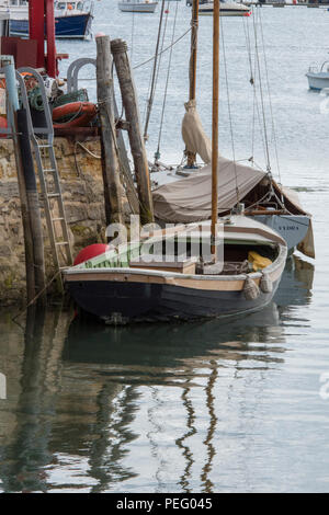 Fishing boat alongside old wooden quay at Ballstad 