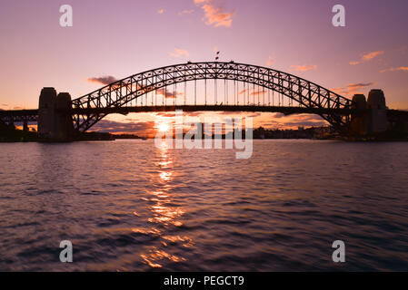 Silhouette of Sydney Harbour Bridge at sunset time Stock Photo