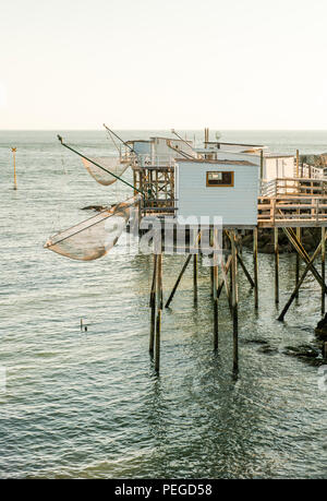 Traditional fishing huts on stilts (carrelets) at Royan, western France Stock Photo