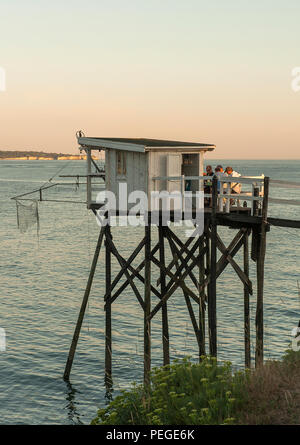 Traditional fishing huts on stilts (carrelets) at Royan, western France Stock Photo