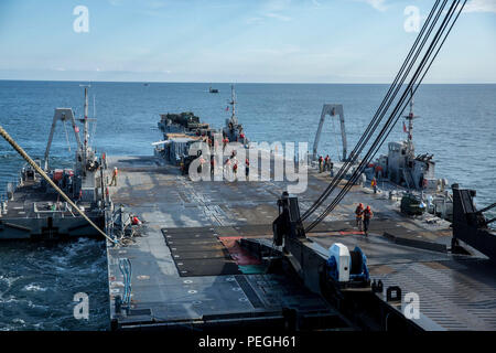 A ramp attached to the USNS 1st Lt. Jack Lummus rests on a Roll-on/Roll ...